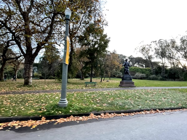 Urban park with statue monument surrounded by mature trees and lamp post during autumn, San Francisco. — Golden Gate Park, San Francisco