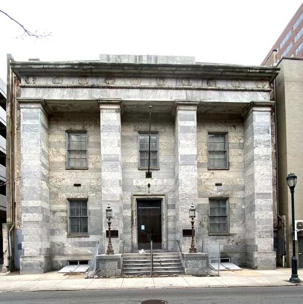 Declaration House, a historic stone building with neoclassical architecture, viewed from street level in Philadelphia. — Center City, Philadelphia