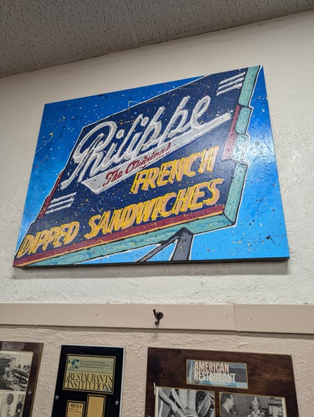 Vintage neon sign for Philippe's restaurant, a historic Los Angeles establishment offering French dipped sandwiches… — Civic Center, Los Angeles