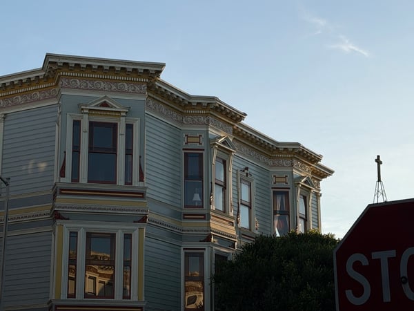 Victorian-style house with ornate cornice and bay windows, viewed from street level in San Francisco. — Haight-Ashbury, San Francisco