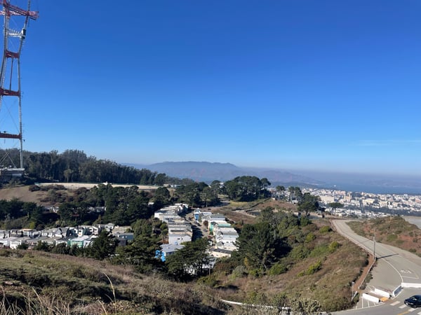 Expansive view of San Francisco from Twin Peaks, showing residential neighborhoods, bay waters, and distant mountains… — Midtown Terrace, San Francisco