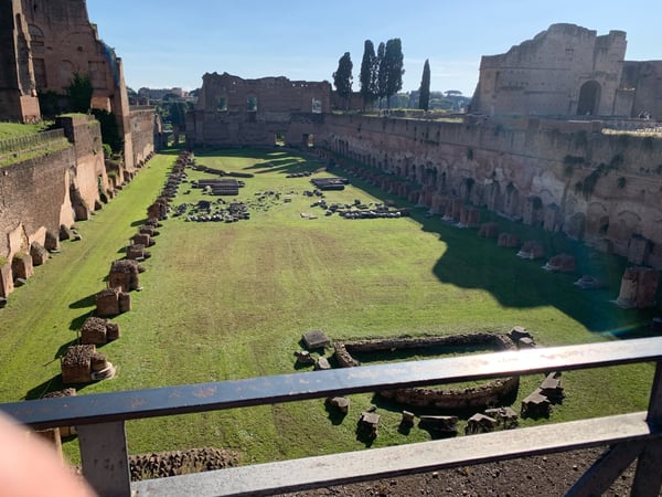 Ruins of Domus Augustana on Palatine Hill, Rome, viewed from an elevated walkway overlooking the central courtyard with… — Campitelli, Rome