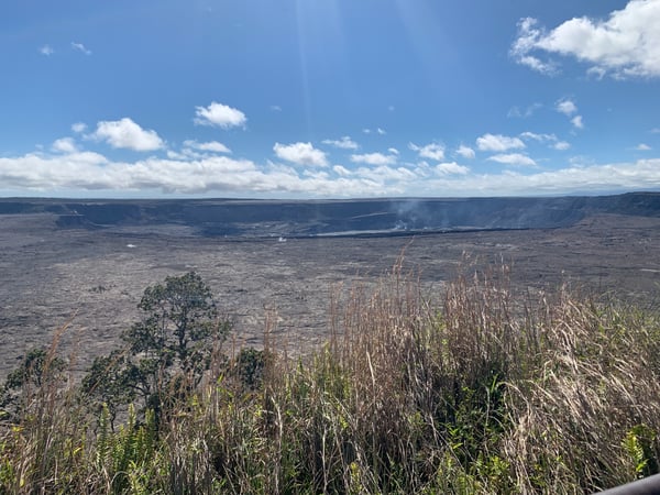 Kilauea caldera with steam vents visible in the volcanic crater, viewed from the rim in Hawaii Volcanoes National Park. — Big Island, Hawaii